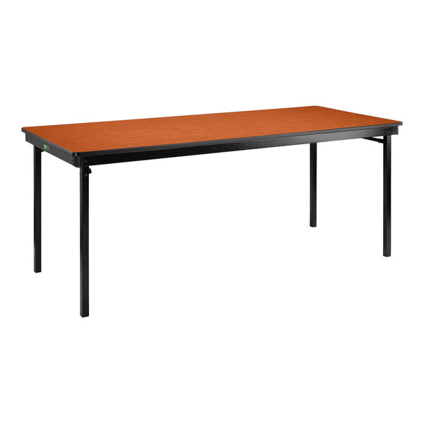 A National Public Seating rectangular table with black legs and a wild cherry top with T-mold edge.