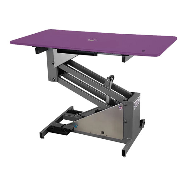 A Groomer's Best electric purple grooming table with metal legs.
