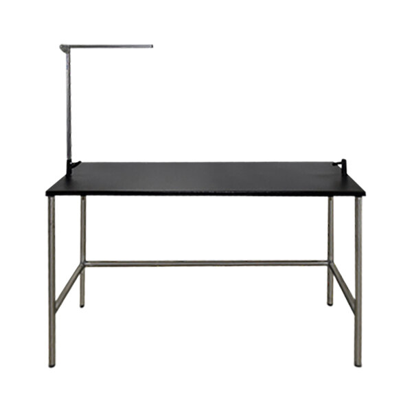A black stainless steel Groomer's Best grooming table with an arm.