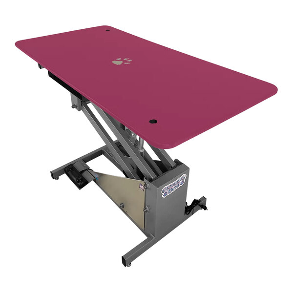 A Groomer's Best electric pink grooming table with a grey base.