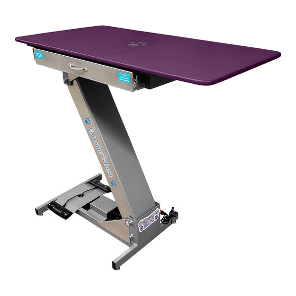 A Groomer's Best purple table on a silver base.