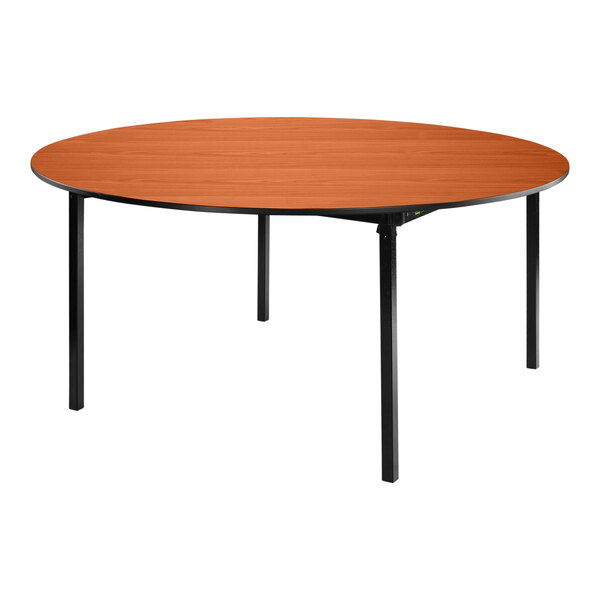 A National Public Seating round table with a wild cherry top and black T-Mold edge on black metal legs.