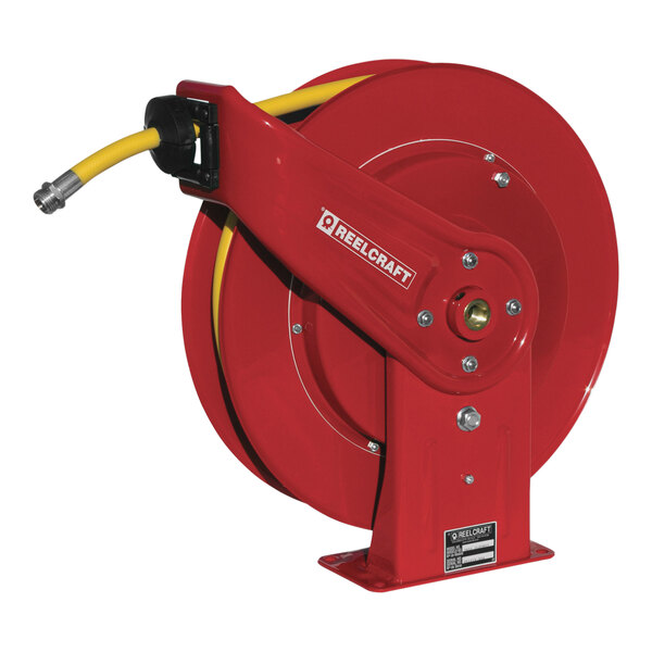 A red Reelcraft garden hose reel with a yellow hose attached.