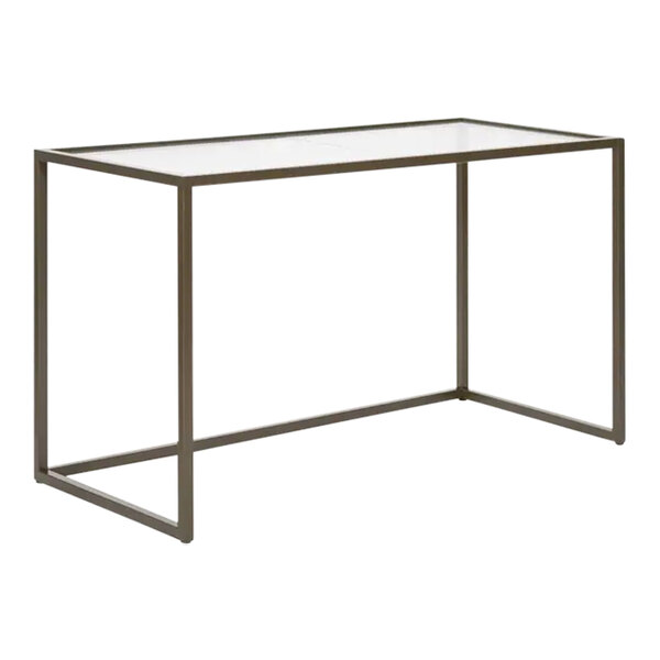 A bronze metal table with glass top.