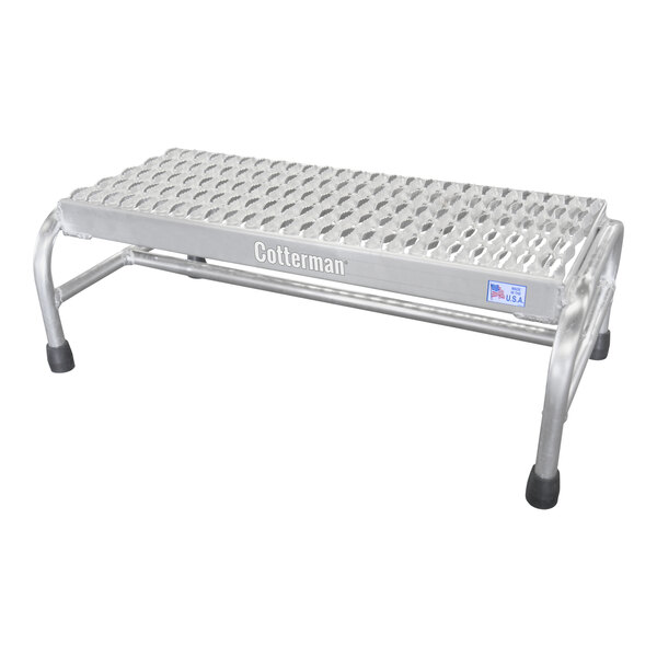 A Cotterman aluminum step stand with serrated treads.