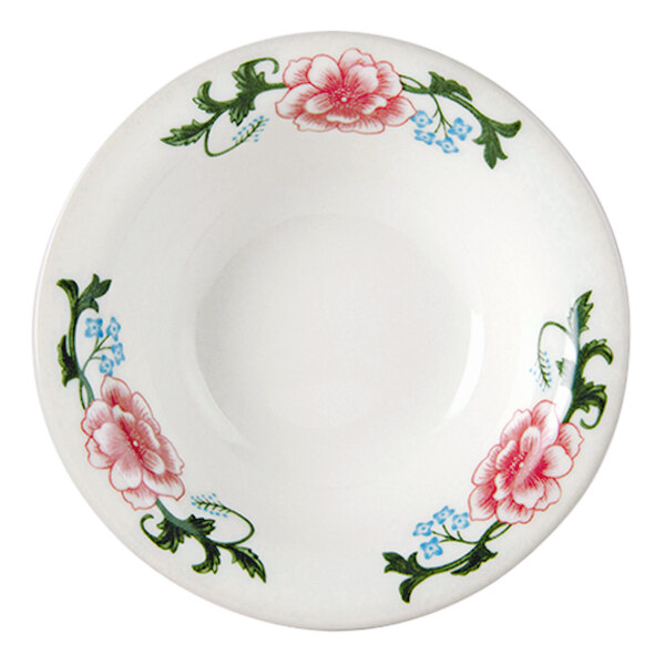 A Tuxton Western Rose china fruit dish with a white background and pink flowers on it.