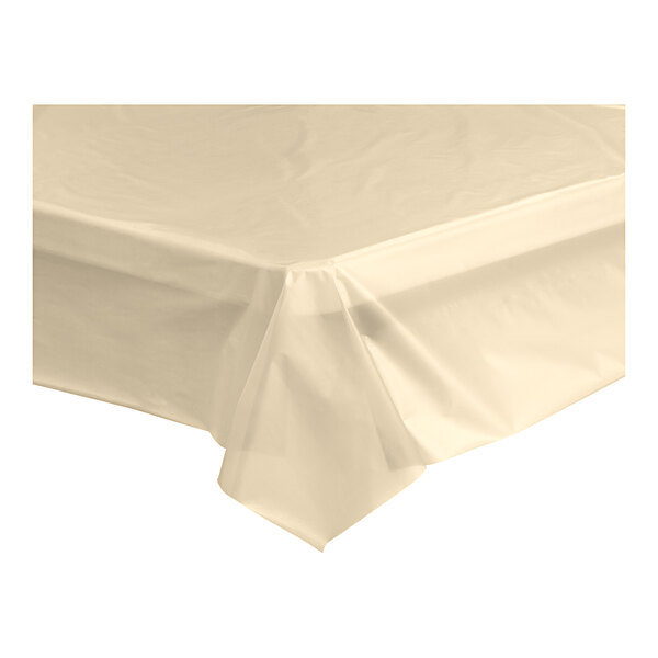 An ivory plastic table cover on a white surface.