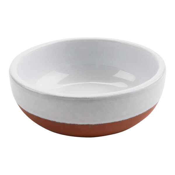 A white bowl with a brown rim.