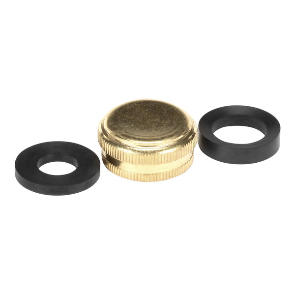 A black rubber gasket with a brass nut on a black circle.