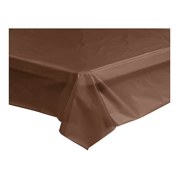 A brown Table Mate plastic table cover roll on a table.