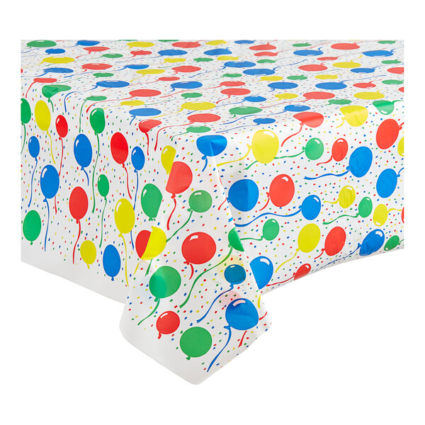 A Table Mate plastic table cover with colorful balloons on it.