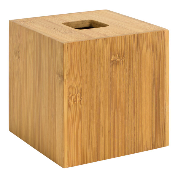 A natural bamboo square tissue box cover with a square hole in the top.