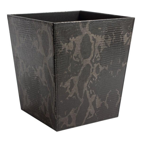 A black and grey square Room360 Sumatra wastebasket with a snake print.