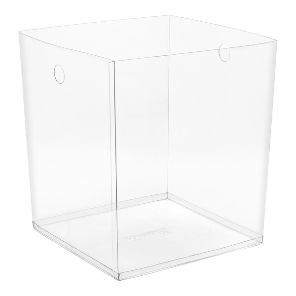 A clear plastic cube with a handle.