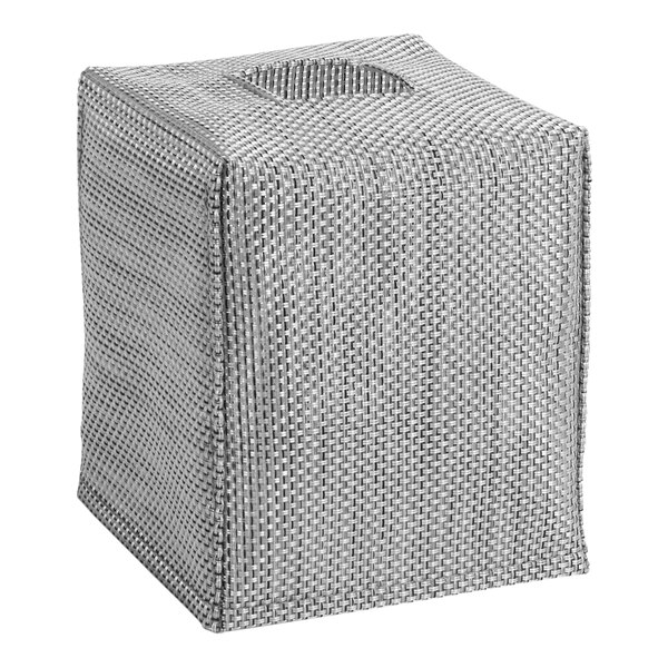 A close-up of a grey and white square tissue box cover with a mesh pattern.