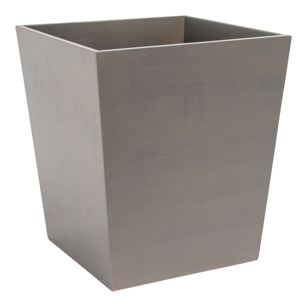 A grey square bamboo wastebasket.