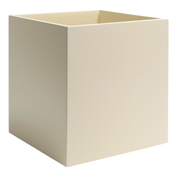 A beige resin cube wastebasket with a hole in the middle.