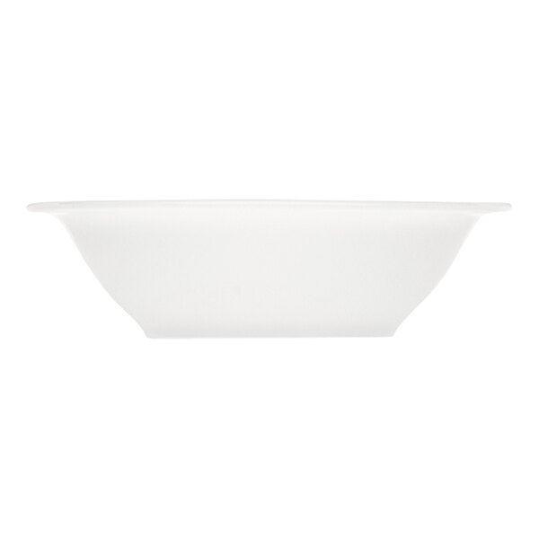 A Bauscher bright white porcelain salad bowl with an embossed design.