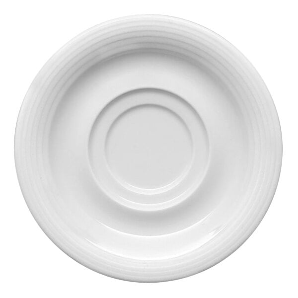 A Bauscher bright white porcelain saucer with a circular pattern on the rim.