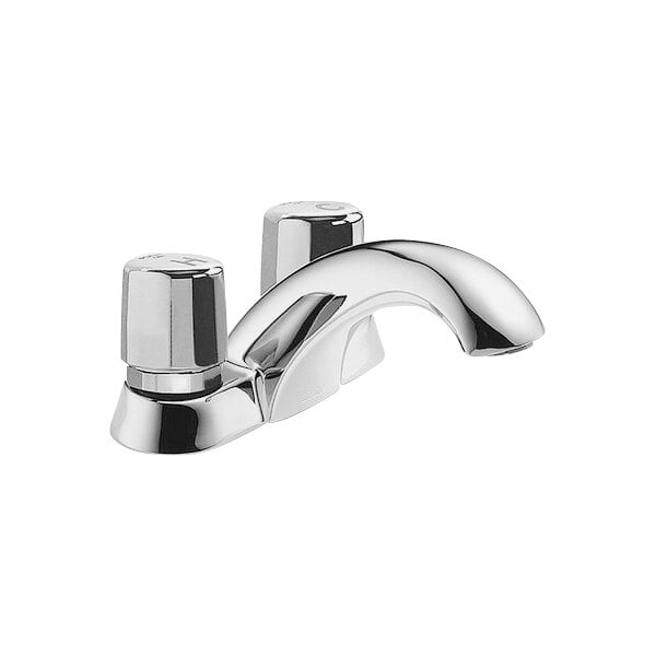A Delta chrome metering faucet with push handles.