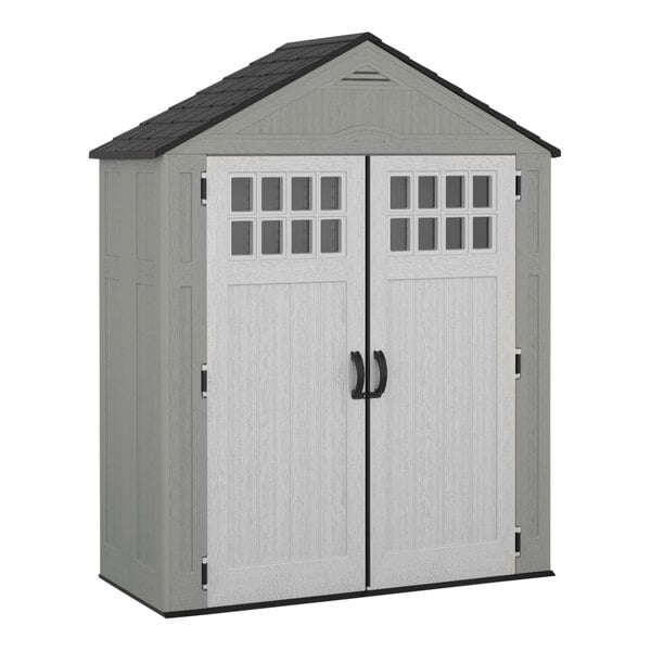 A gray Suncast storage shed with two black doors.