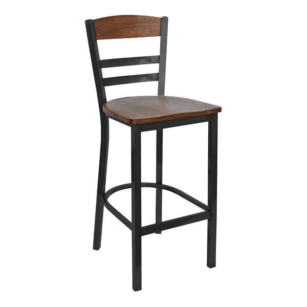 A BFM Seating black steel barstool with an autumn ash wood seat and back.