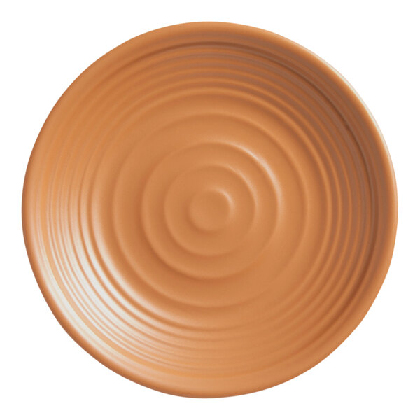 A brown American Metalcraft Marra melamine plate with a spiral design on it.