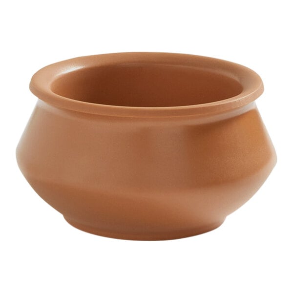 An American Metalcraft terracotta bowl with a white background.