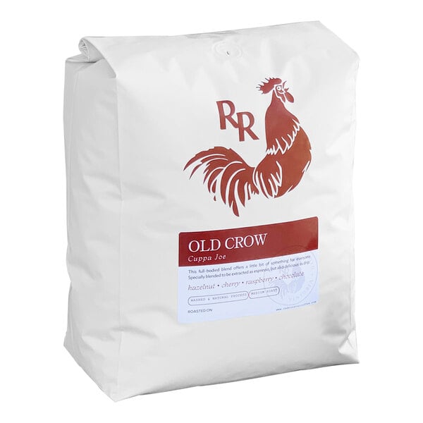 A white bag of Red Rooster Organic Old Crow Cuppa Joe Whole Bean Coffee with a red logo.