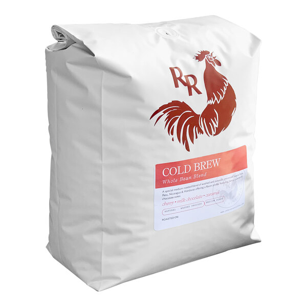 A white bag of Red Rooster Whole Bean Coffee with a red label featuring a rooster.