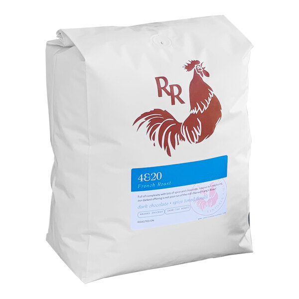 A white bag of Red Rooster Whole Bean Coffee with a red rooster on it.