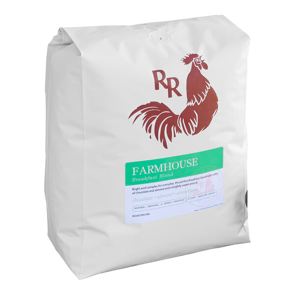 A white bag of Red Rooster Organic Floyd Farmhouse Breakfast Blend Whole Bean Coffee with a red rooster on it.