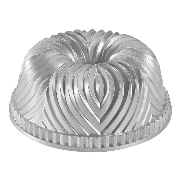 A close-up of a Nordic Ware Bundt cake pan with a swirl design.