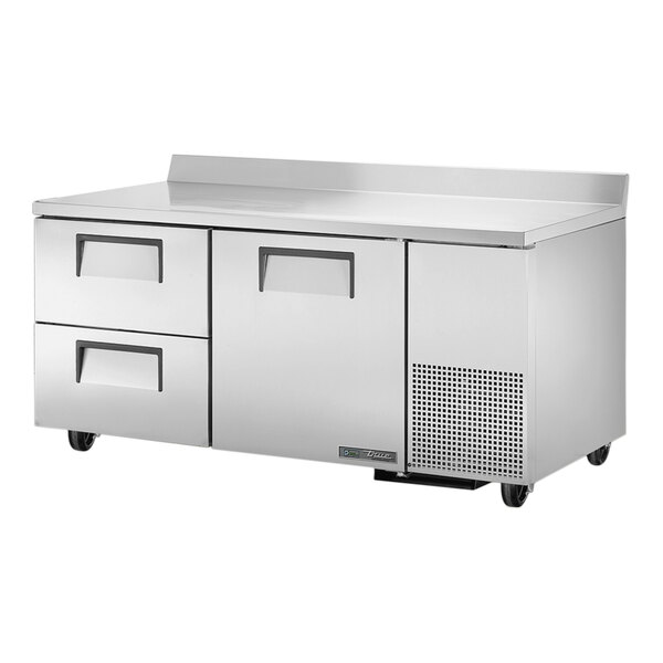 A stainless steel True worktop refrigerator with two drawers.
