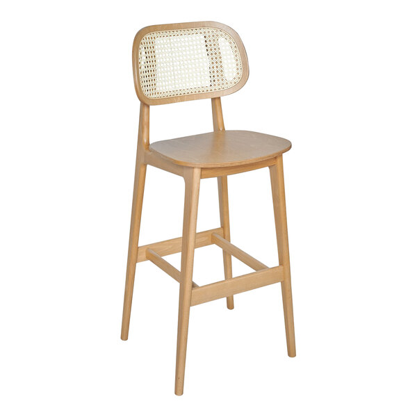 A BFM Seating Emma wood barstool with cane backrest.
