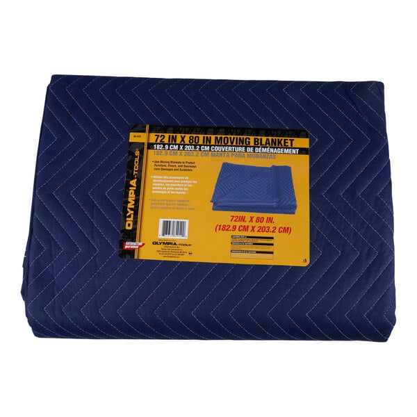 A blue Olympia Tools moving blanket with a yellow label.