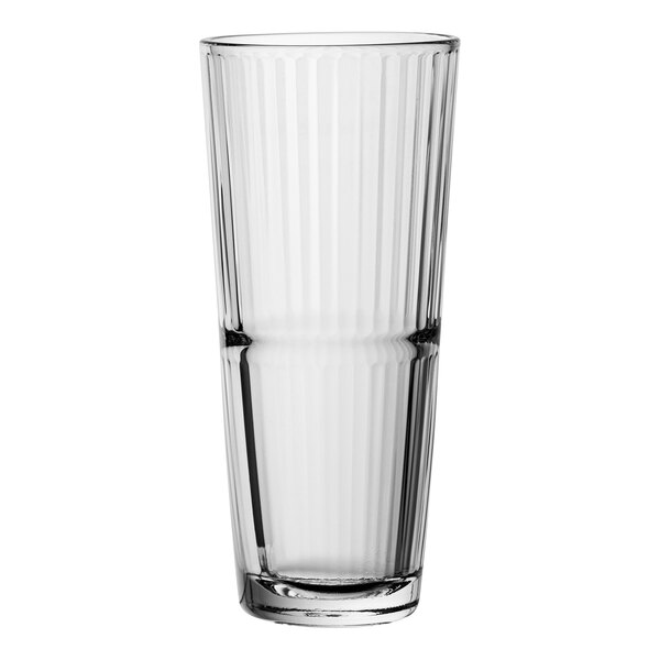 A close-up of a clear Pasabahce Grande Sunray long drink glass with a thin rim.