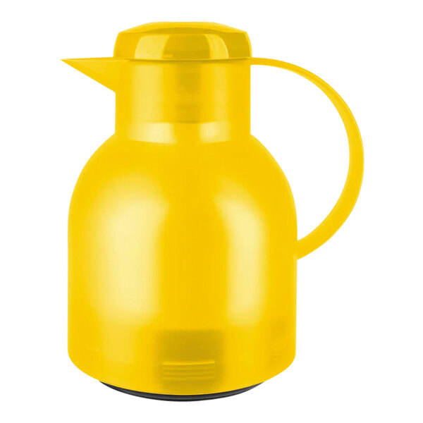 A yellow plastic carafe with a handle.
