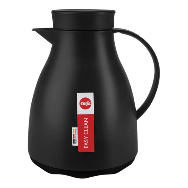A black EMSA vacuum insulated coffee carafe with a red and white label.