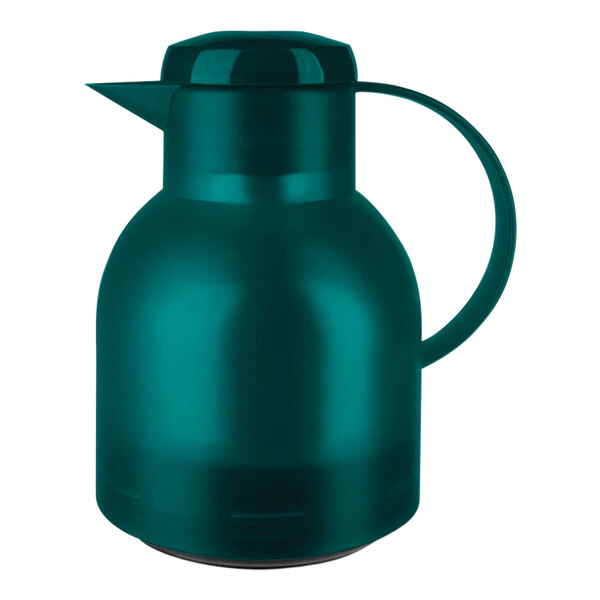A transparent turquoise plastic carafe with a handle.