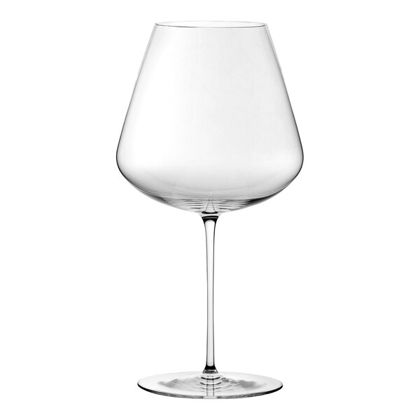 A close-up of a Nude Stem Zero red wine glass with a clear stem.