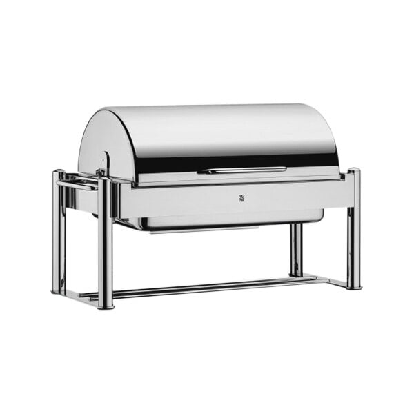 A WMF stainless steel roll top chafer with 3 porcelain inserts.