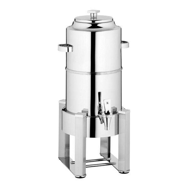 A stainless steel WMF Manhattan coffee urn with a white lid.