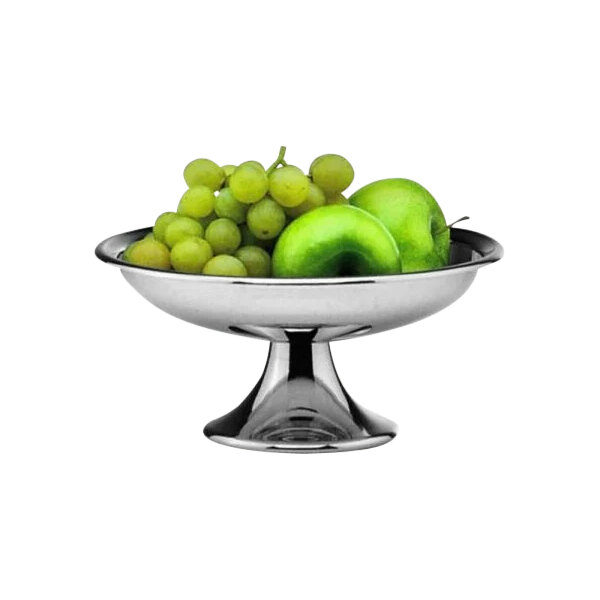 A Hepp silver plated stainless steel fruit bowl filled with green apples and grapes.