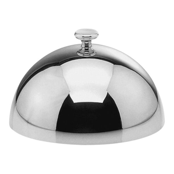 A Hepp silver plated stainless steel dome cover on a tray.