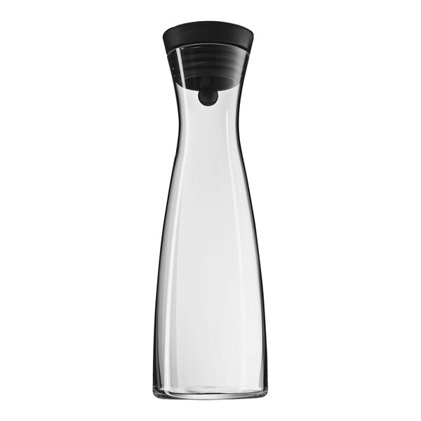 A clear glass carafe with a black lid.