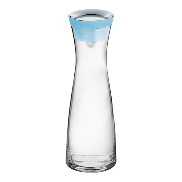 A clear glass carafe with a blue lid.