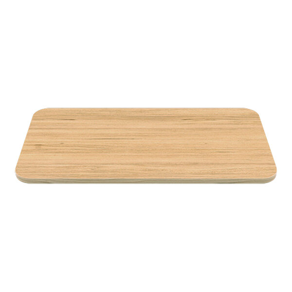 A rectangular wood grain plate on a table.
