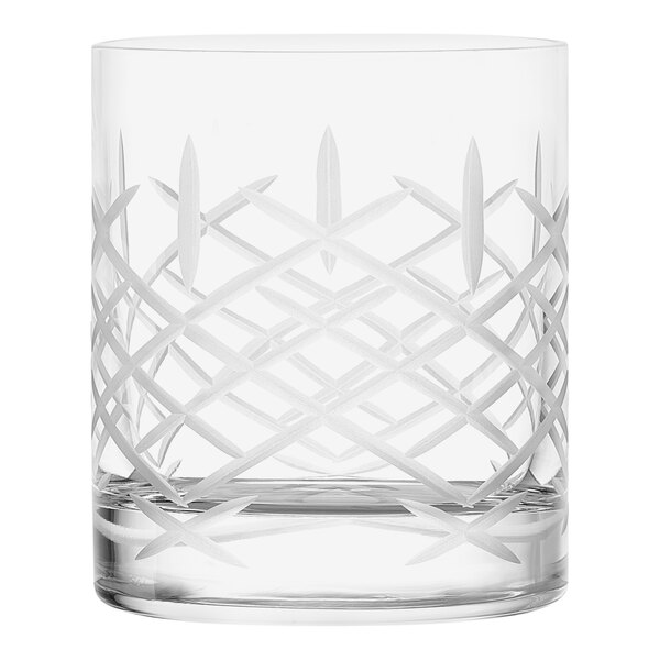 A close up of a Stolzle Rocks / Double Old Fashioned Glass with a design on it.