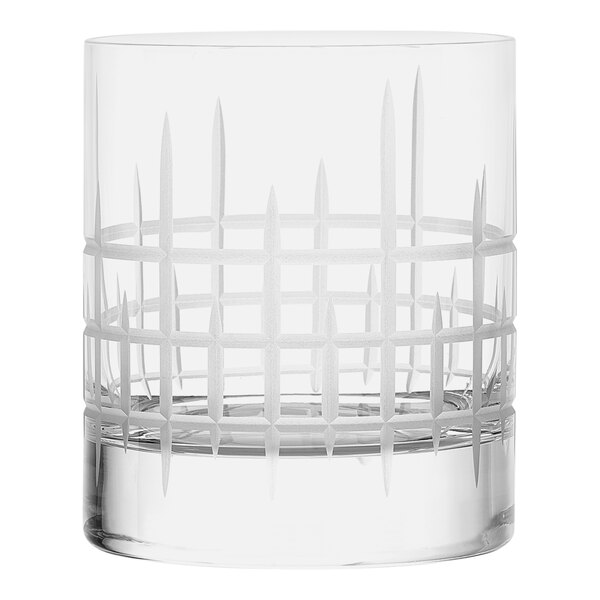 A clear Stolzle double old fashioned glass with a white design.